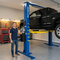 Two-Post Car Lift Engineered for Heavy-Duty Use, 12000 lb Capacity, 220V 4HP Motor, Single-Point Lock — Lifestyle
